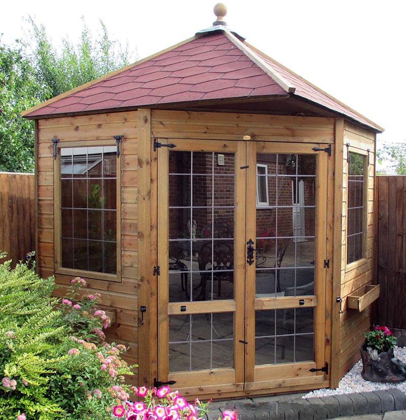 corner summerhouse with tile effect roof