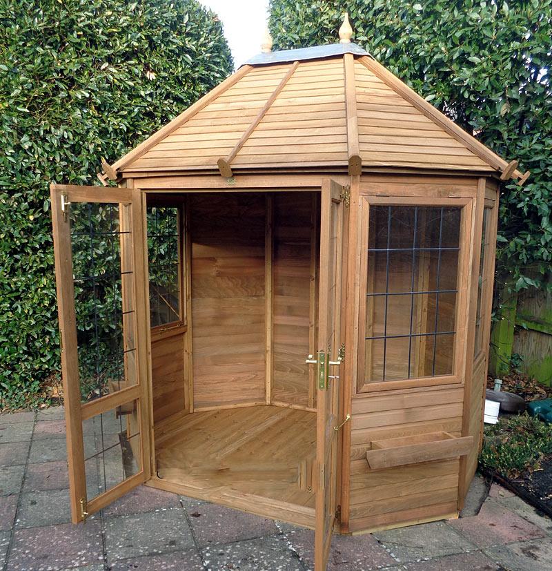 cedar summerhouse with open doors