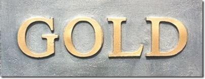 Lead sign with Gold written in gold.