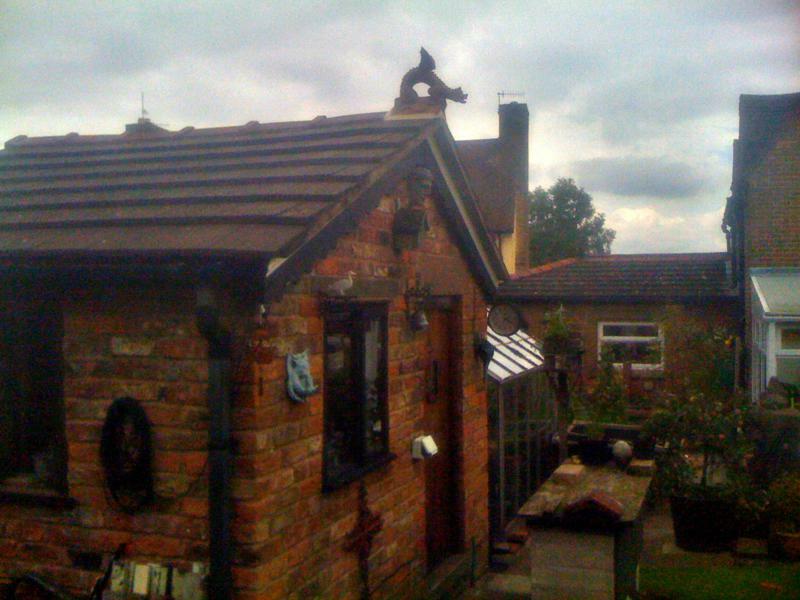Garden workshop roof dragon finial