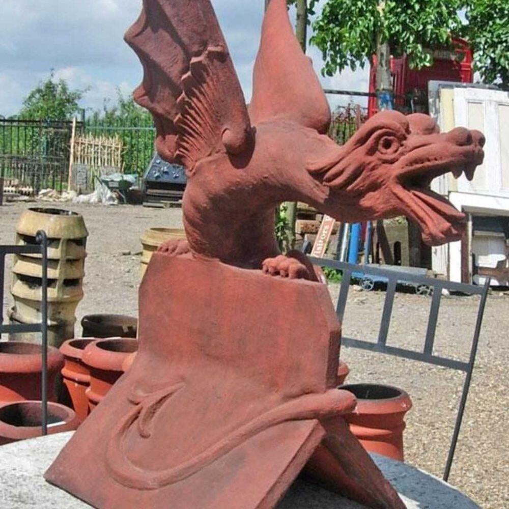 Terracotta roof dragon finial in a reclamation yard