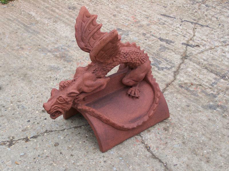 Baby dragon roof finial in Marley colour, terracotta, half round