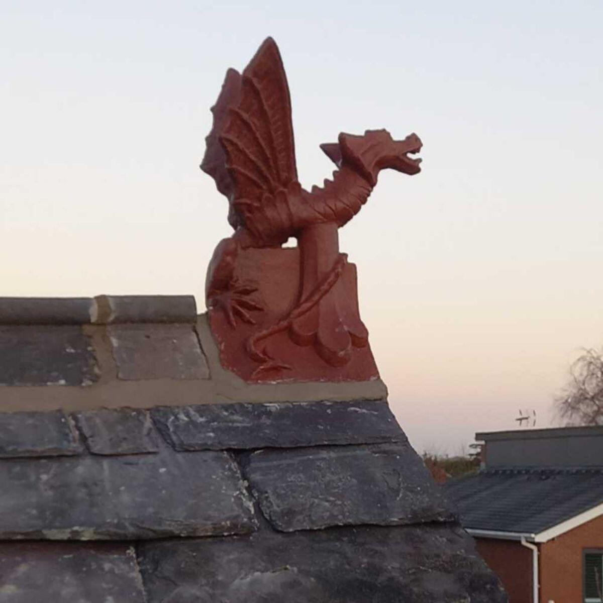 Emperor dragon finial installed on a gable roof