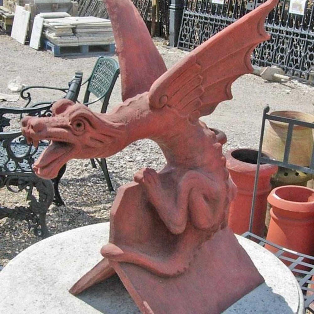 Terracotta roof dragon finial in a salvage yard