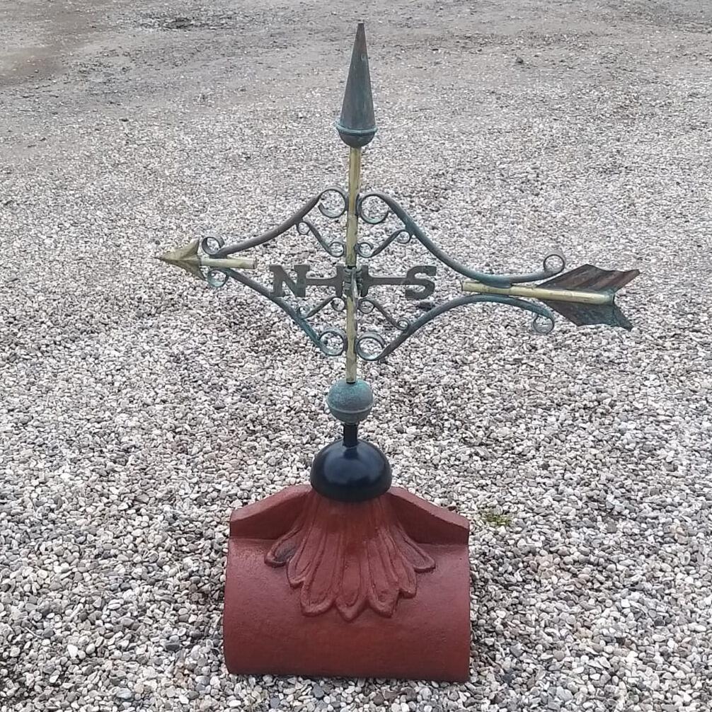 Victorian arrow weathervane supplied on a half round ridge tile
