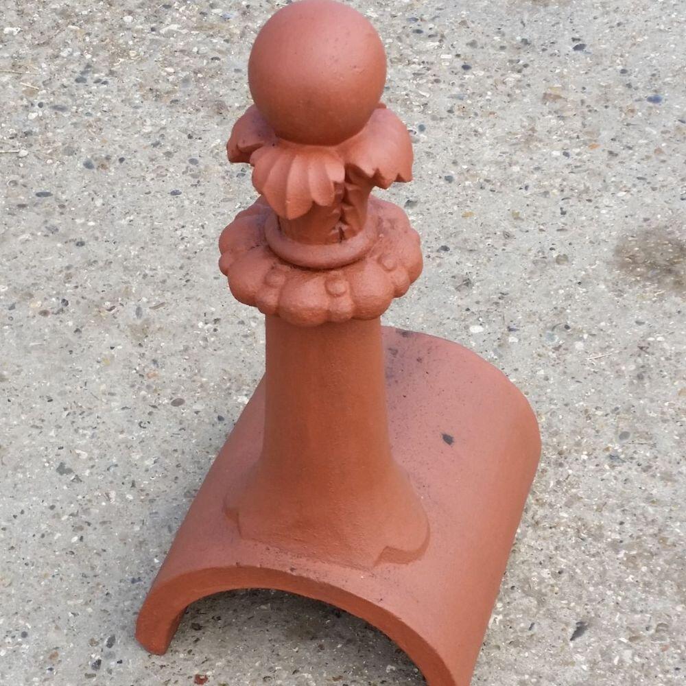 Tall half round small fleur roof finial
