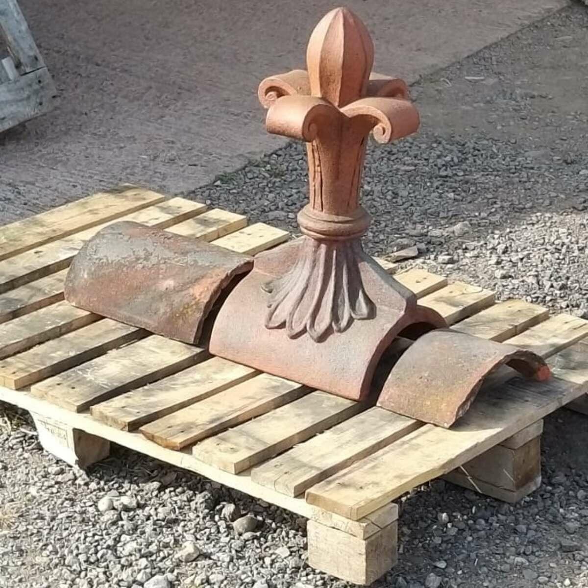 Fleur de lys roof finial colour matched to reclaimed ridge tiles