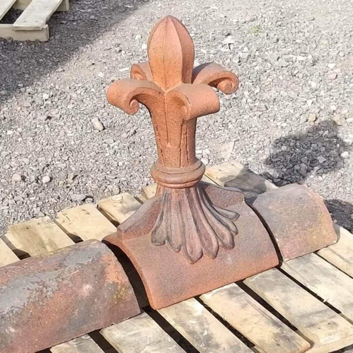 Fleur de lys roof finial colour matched to reclaimed ridge tiles