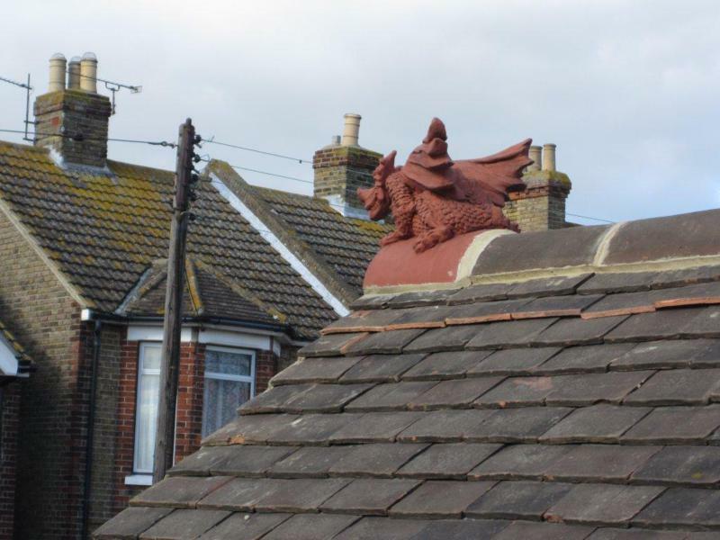 Half round terracotta roof dragon in Kent