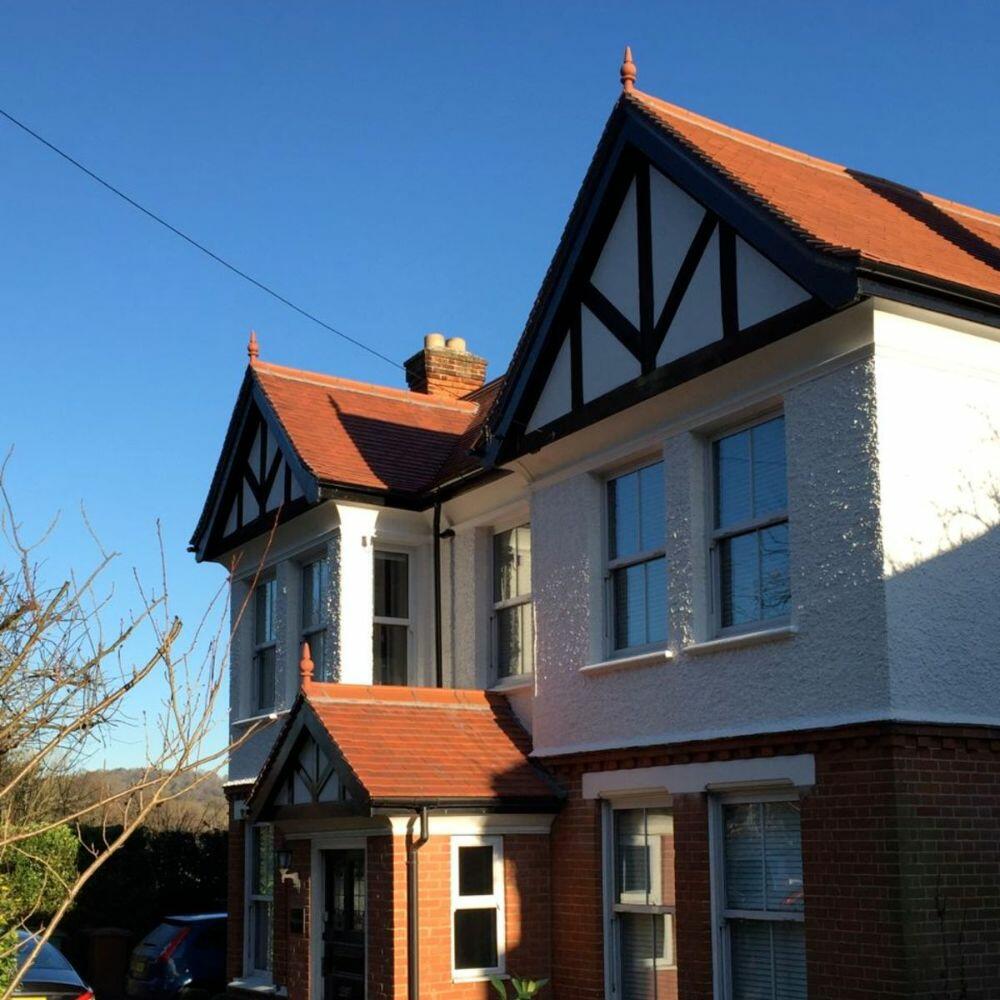 Gable roof finials and ornamental ridge tiles for roofs