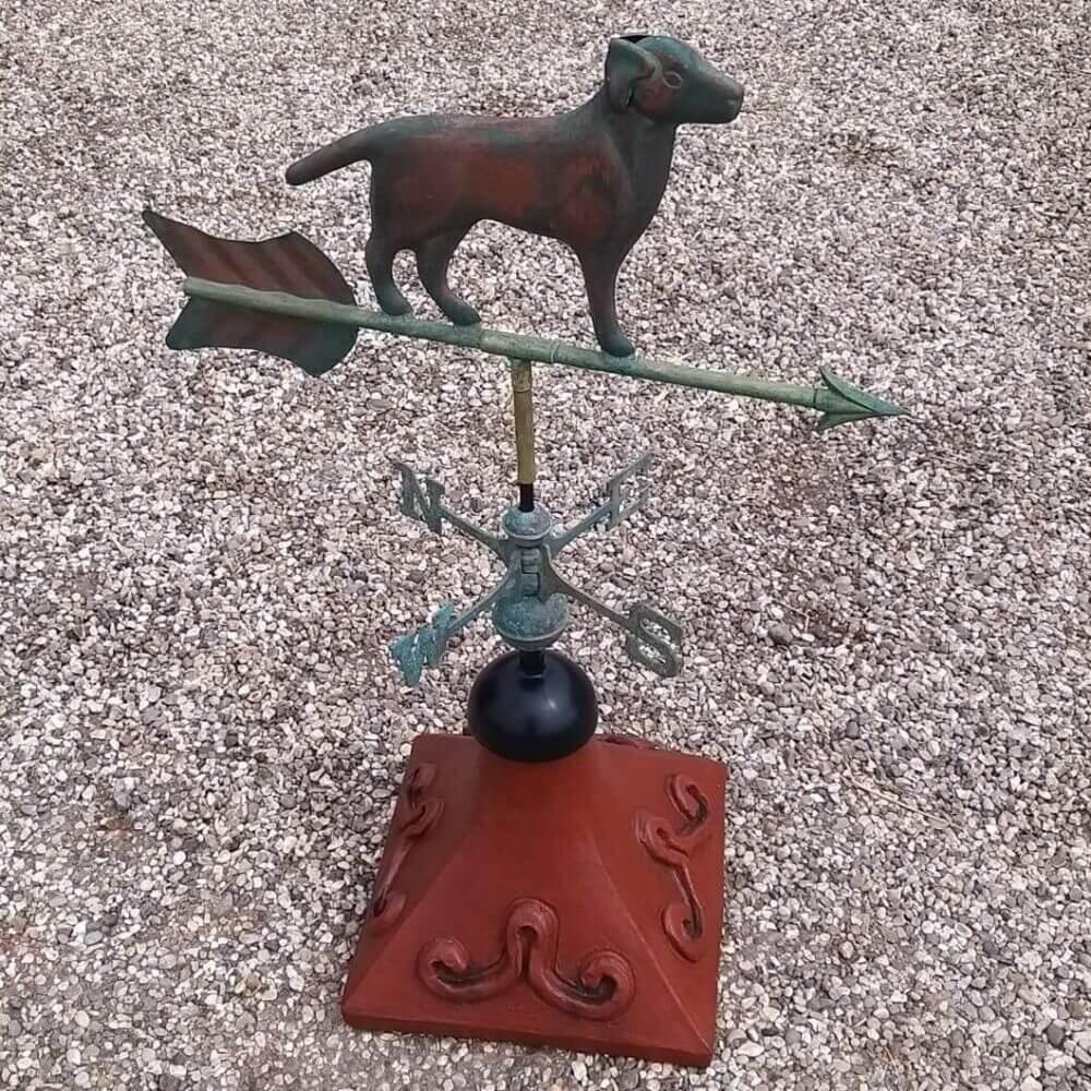 Labrador weathervane fitted on a square ridge tile cap