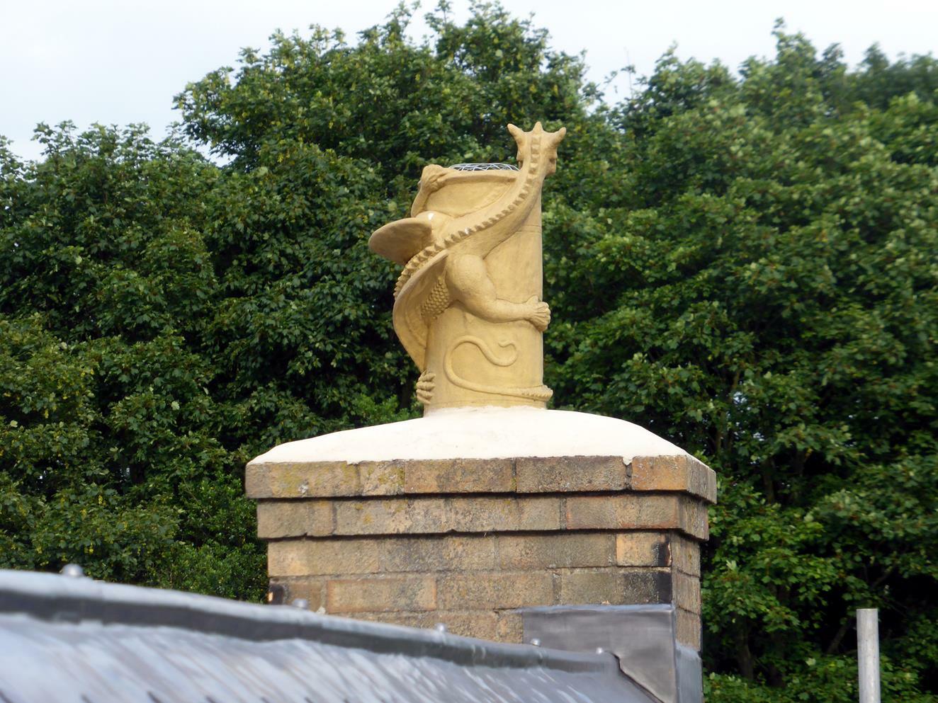 Installation of a yellow buff dragon chimney pot in Holtby, York