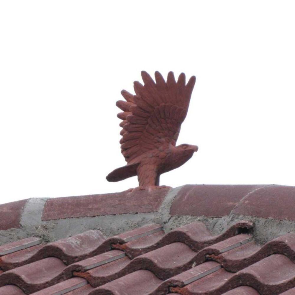 Hawk finial installed on a roof