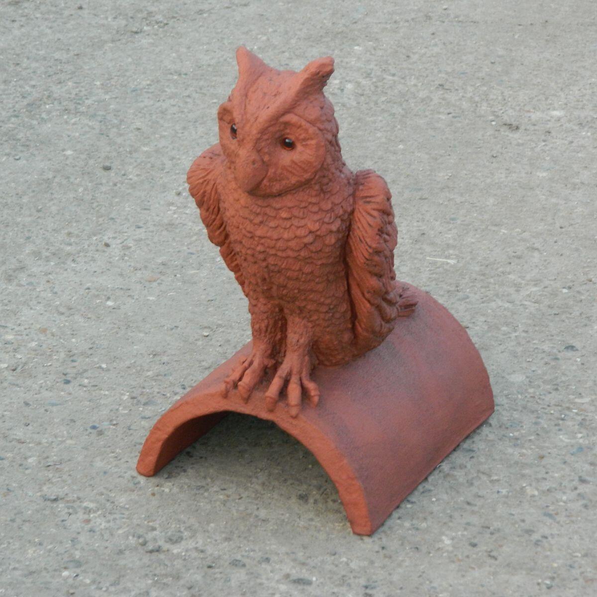 Brown glass was used for the eyes of an owl roof finial ornament