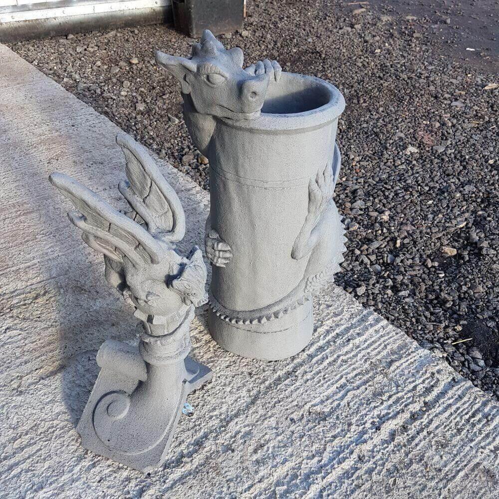 Pair of slate grey dragon chimney pots