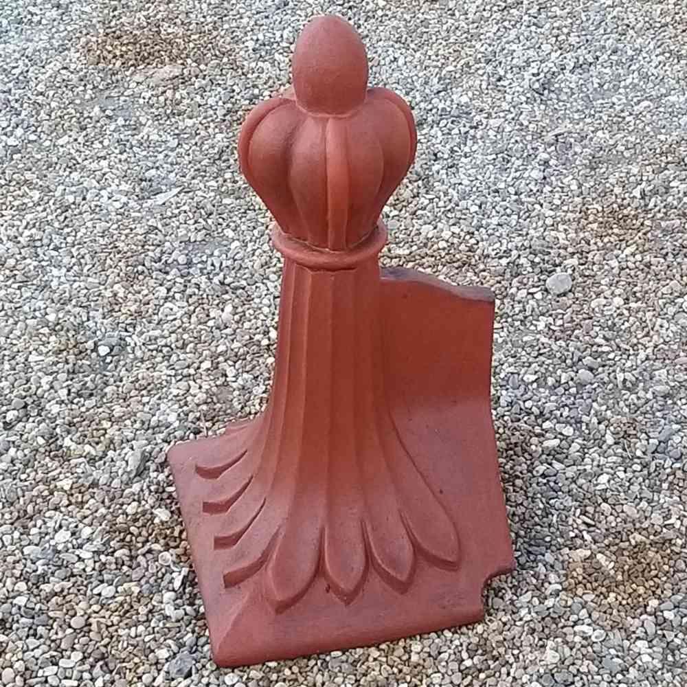 Angled block end coronation crest ridge finial