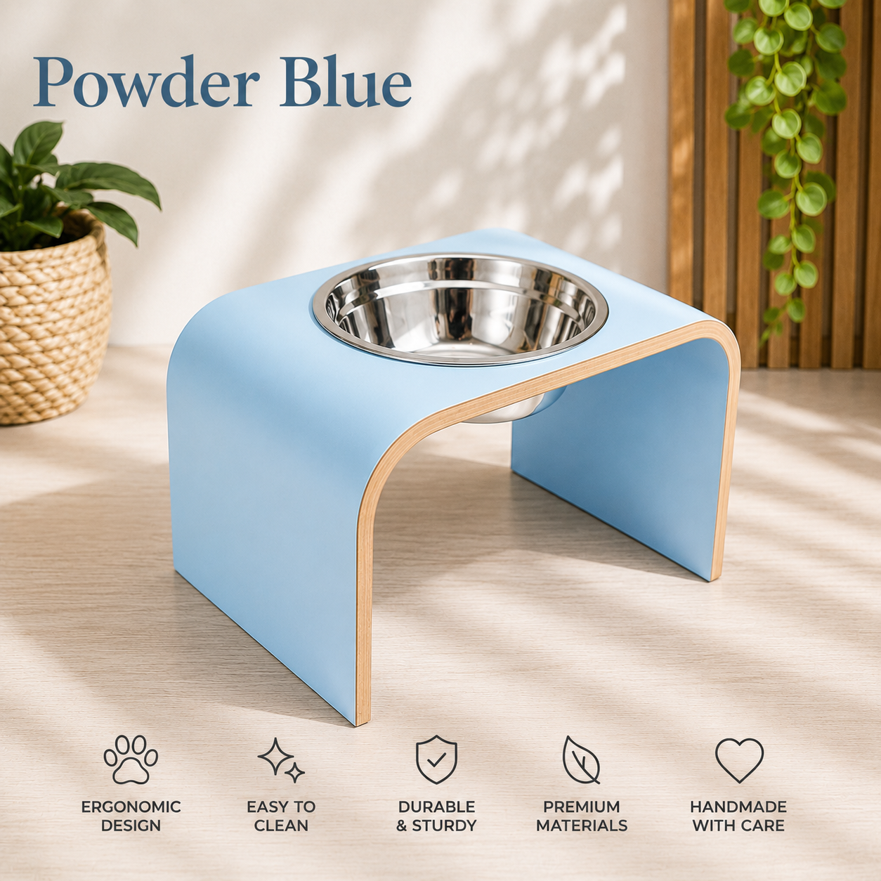 Handmade powder blue raised dog bowl stand with stainless steel bowl, modern curved wooden elevated feeder for dogs and cats by Lola & Daisy Designer Pets.