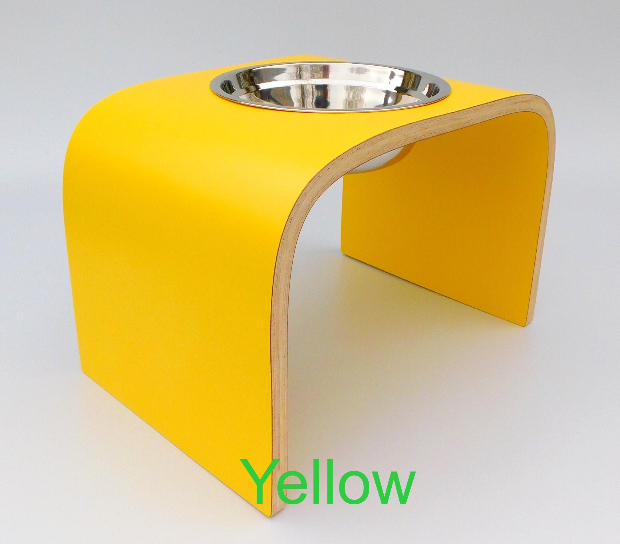 side view of yellow single bowl dog feeder raised
