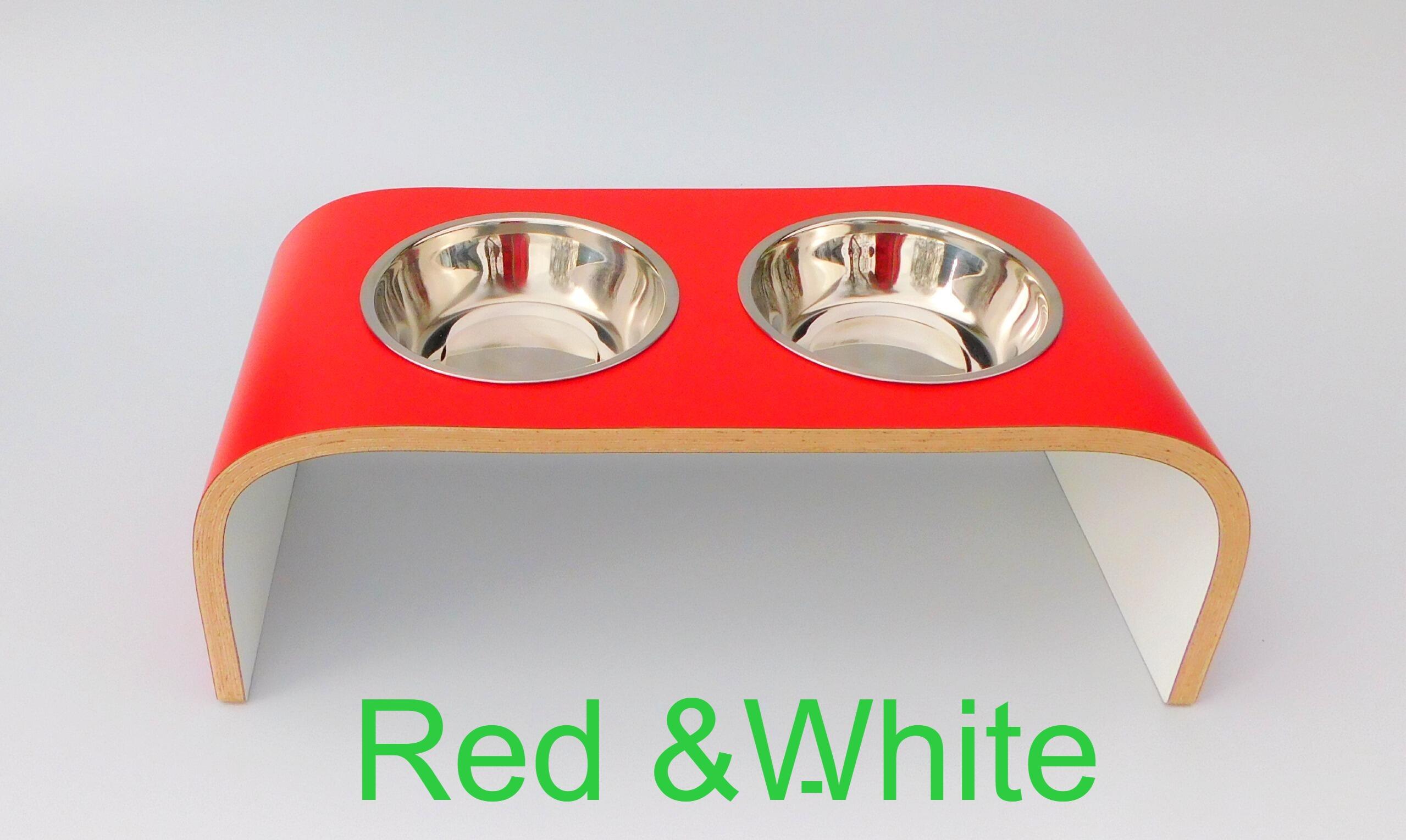 above front view of double bowl raised pet feeder with red top and white underside