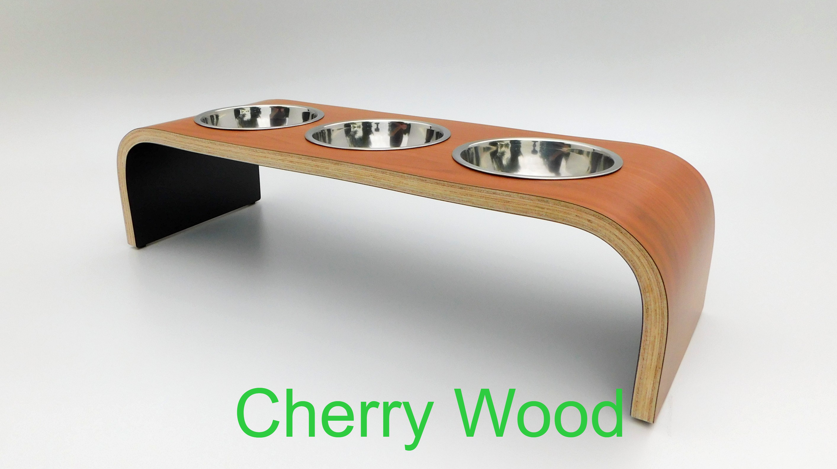 right front view of cherry wood raised pet bowl holder with three stainless steel bowls